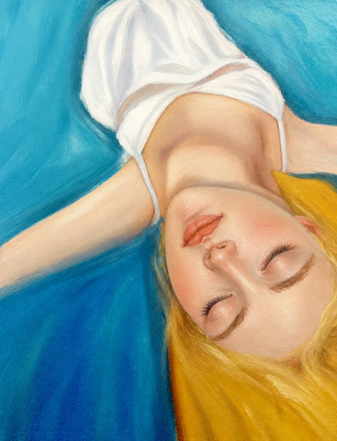 A quiet upside down portrait with closed eyes, blonde hair, and saturated blue and gold color fields.