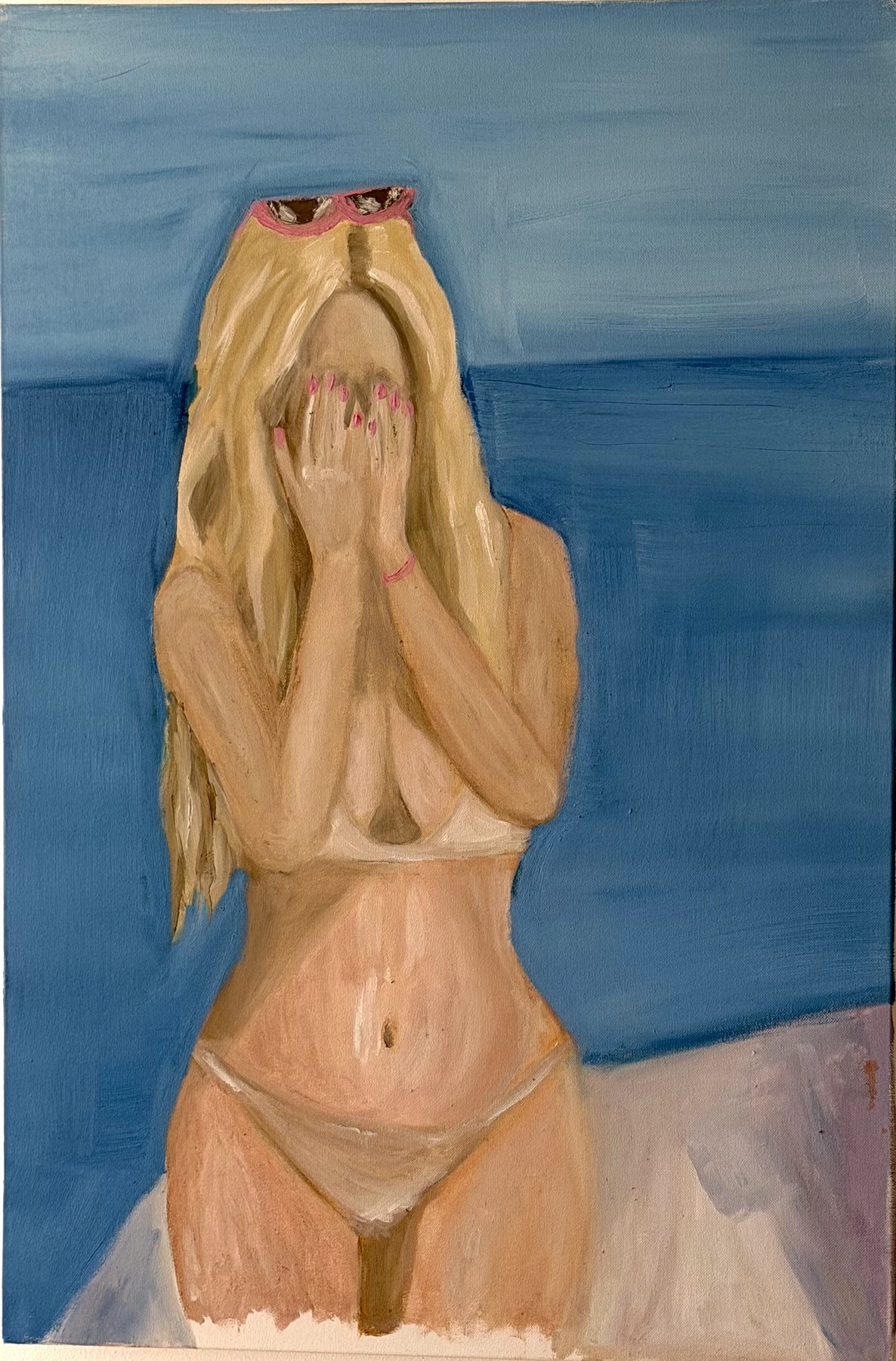 A blonde figure with pink sunglasses pushed up and both hands over her face, against sea and sky.
